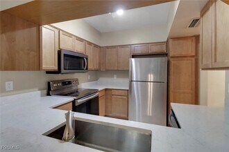 100 Siena Way in Naples, FL - Building Photo - Building Photo