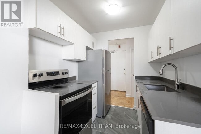 property at 165 Cosburn Ave.