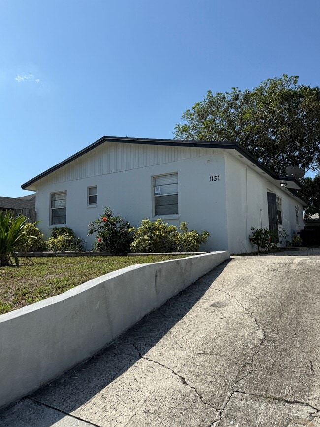 property at 1131 W 26th St