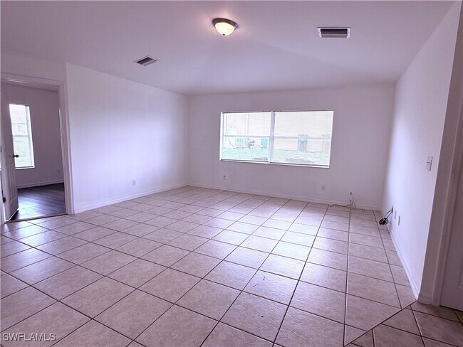 1135 Harry Ave S in Lehigh Acres, FL - Building Photo - Building Photo