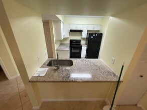 1130 Lake Shore Dr, Unit 101 in Lake Park, FL - Building Photo - Building Photo