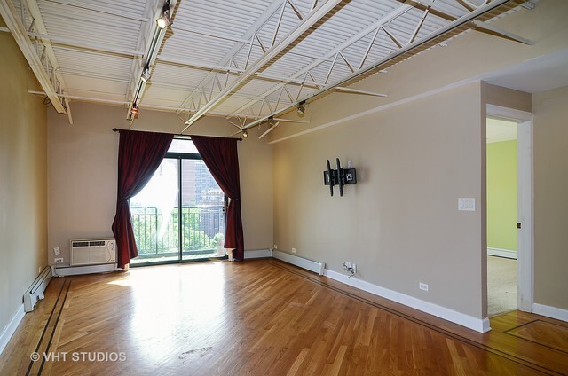 3900 N Pine Grove Ave in Chicago, IL - Building Photo - Building Photo