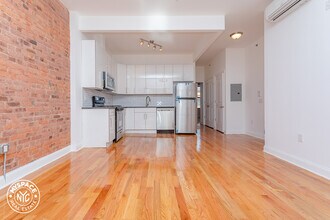 56-48 Myrtle Ave-Unit -1 in Queens, NY - Building Photo - Building Photo