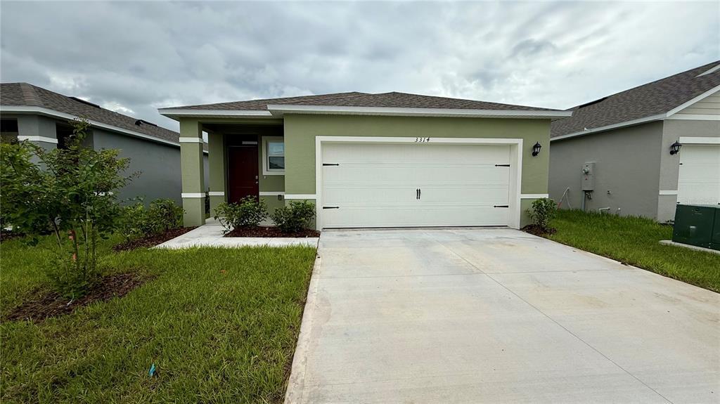 3314 Pine Lily Ave in Poinciana, FL - Foto de edificio