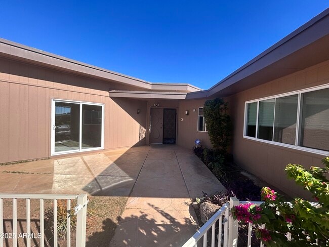 property at 10838 W Thunderbird Blvd