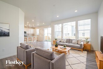 10995 Uvalda St, Unit 106 in Commerce City, CO - Building Photo - Building Photo