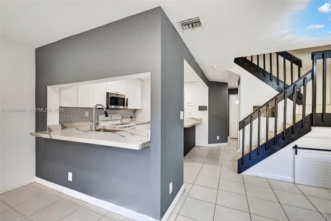 property at 5843 Woodlands Blvd