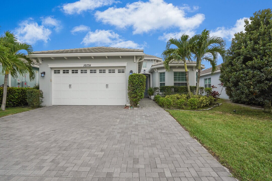 16074 Whippoorwill Cir in Westlake, FL - Building Photo