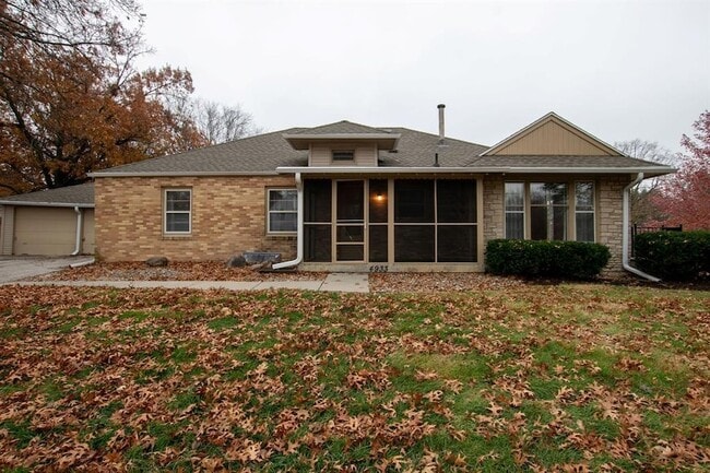 property at 4933 Woodland Ave