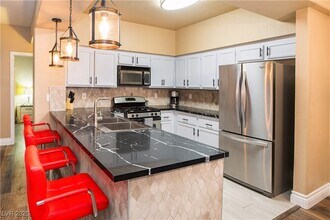 7713 Himalayas Ave in Las Vegas, NV - Building Photo - Building Photo