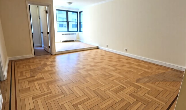 property at 124 E 24th St