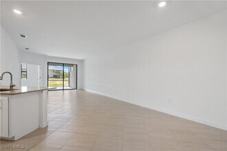 14107 Winding Cedar Wy in Miromar Lakes, FL - Building Photo - Building Photo