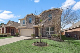 21126 Normandy Glen St in Kingwood, TX - Building Photo - Building Photo