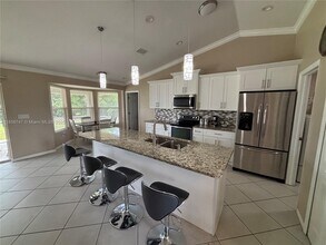 4118 SW 8th Ct in Cape Coral, FL - Building Photo - Building Photo