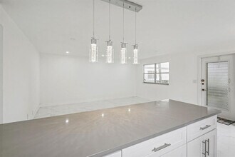 100 Monaco Ct in Delray Beach, FL - Building Photo - Building Photo