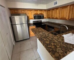 12142 St.Andrews Pl in Miramar, FL - Building Photo