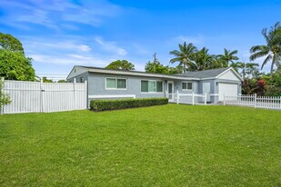 2071 W Carol Cir in West Palm Beach, FL - Building Photo