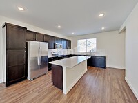 4457 Crestone Peak St in Brighton, CO - Foto de edificio - Building Photo