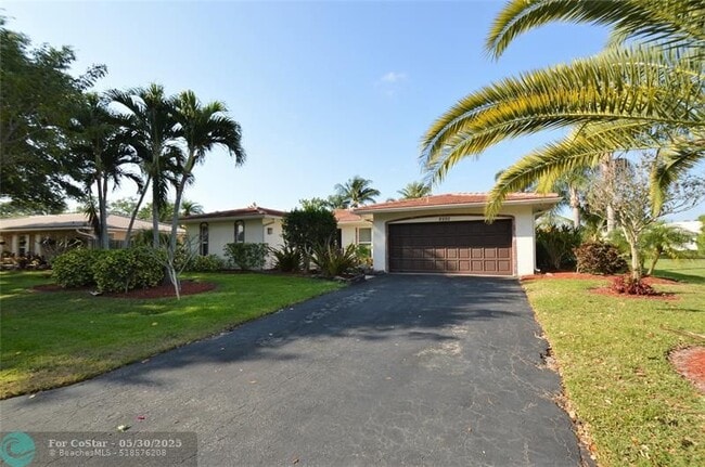 property at 8592 NW 7th St