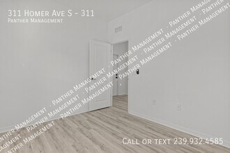311 Homer Ave S-Unit -311 in Lehigh Acres, FL - Building Photo - Building Photo