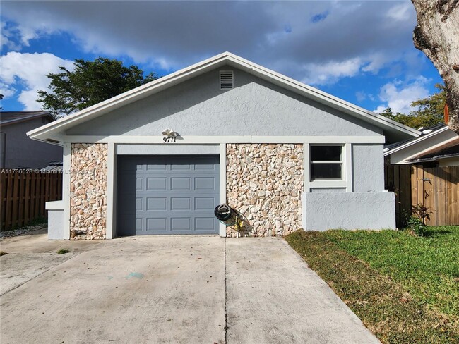 property at 9711 SW 57th St