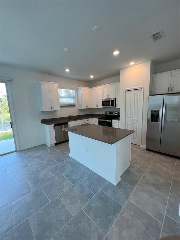 7489 Stone Crk Trl in Kissimmee, FL - Building Photo - Building Photo