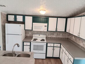 5540 Rainbow Dr in Bokeelia, FL - Building Photo - Building Photo