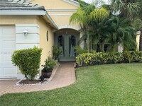 443 SW Talquin Ln in Port St. Lucie, FL - Foto de edificio - Building Photo