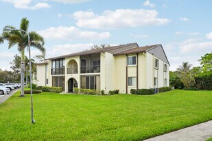5900 Whispering Pine Way in Greenacres, FL - Building Photo