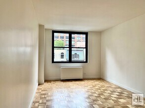 EAST 49 STREET in New York, NY - Building Photo - Building Photo