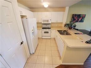 4455 Botanical Pl Cir-Unit -202 in Naples, FL - Building Photo - Building Photo