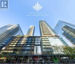 65 Bremner Blvd in Toronto, ON - Building Photo
