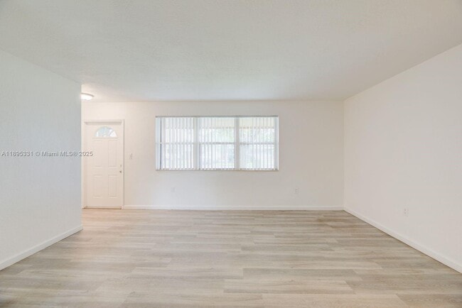 property at 7720 NW 15th St