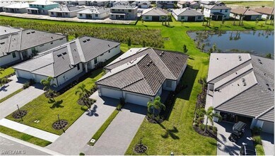 19573 Hinkley Dr in Estero, FL - Building Photo - Building Photo