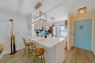 13827 Mission Oaks Blvd, Unit 10C in Seminole, FL - Building Photo - Building Photo