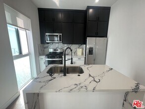 8662 Cadillac Ave in Los Angeles, CA - Building Photo - Building Photo