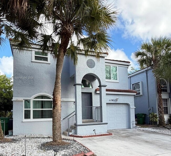 property at 11783 NW 1st St