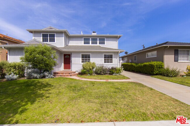 7416 Ogelsby Ave in Los Angeles, CA - Building Photo - Building Photo