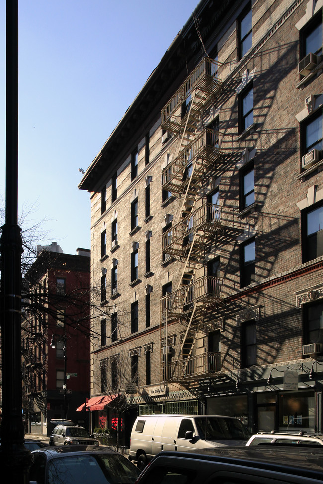 39 Downing St in New York, NY - Foto de edificio - Building Photo