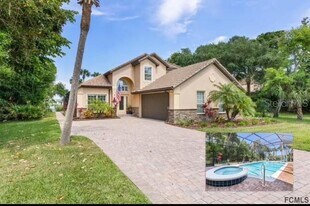 7 S Riverwalk Dr in Palm Coast, FL - Building Photo