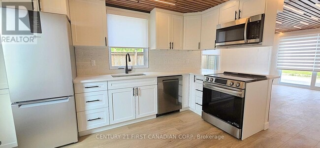 property at 857-857 Dundas St