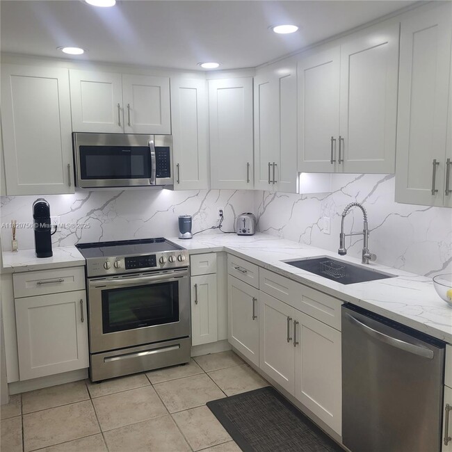 property at 9111 E Bay Harbor Dr