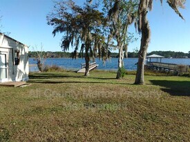 23031 NE 112th Court Rd in Fort McCoy, FL - Building Photo