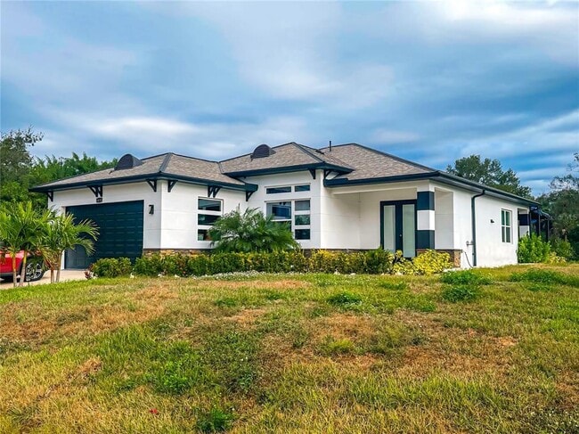 1432 Nabatoff St in North Port, FL - Building Photo - Building Photo