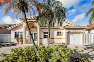 9018 NW 148th St in Miami Lakes, FL - Building Photo - Building Photo