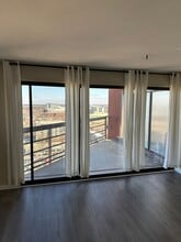 100 Park Ave W, Unit 1704 in Denver, CO - Building Photo - Building Photo