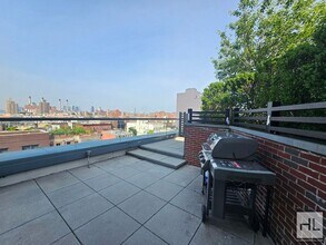 Modern 1-Bedroom with Private Balcony | Ea in New York, NY - Building Photo - Building Photo