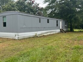 385 Liberty Church Rd in Nettleton, MS - Building Photo