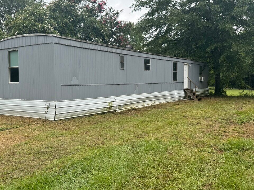 385 Liberty Church Rd in Nettleton, MS - Building Photo