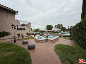 8828 Dempsey Ave in Los Angeles, CA - Foto de edificio - Building Photo